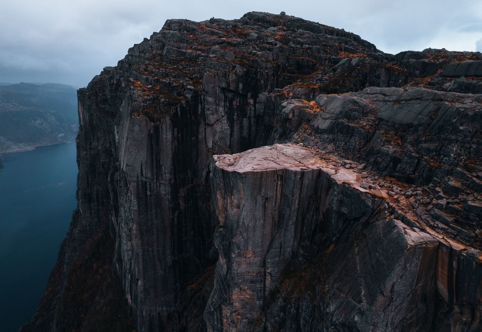 Aerial view of the flat-topped Preikestolen cliff high above the Lysefjord near Stavanger, in a Norway travel guide favorite